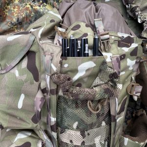 The mesh side pouches feature a separate flat compartment - secured by velcro, designed for stashing bivi poles or other items