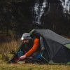 Camper using the Fastboil cooking system gas stove
